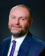 Aleister Saunders headshot